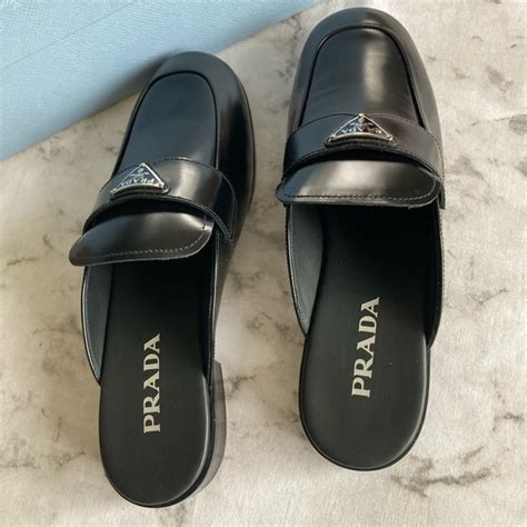 prada mocasini|Prada leather logo mules 40.5.